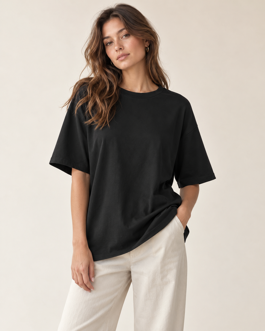Woman wearing Solenne essential oversized t-shirt in black