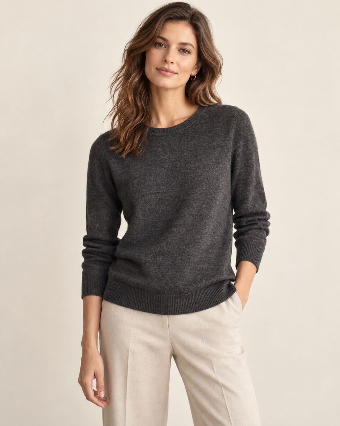 Woman wearing Solenne classic crewneck sweater in charcoal