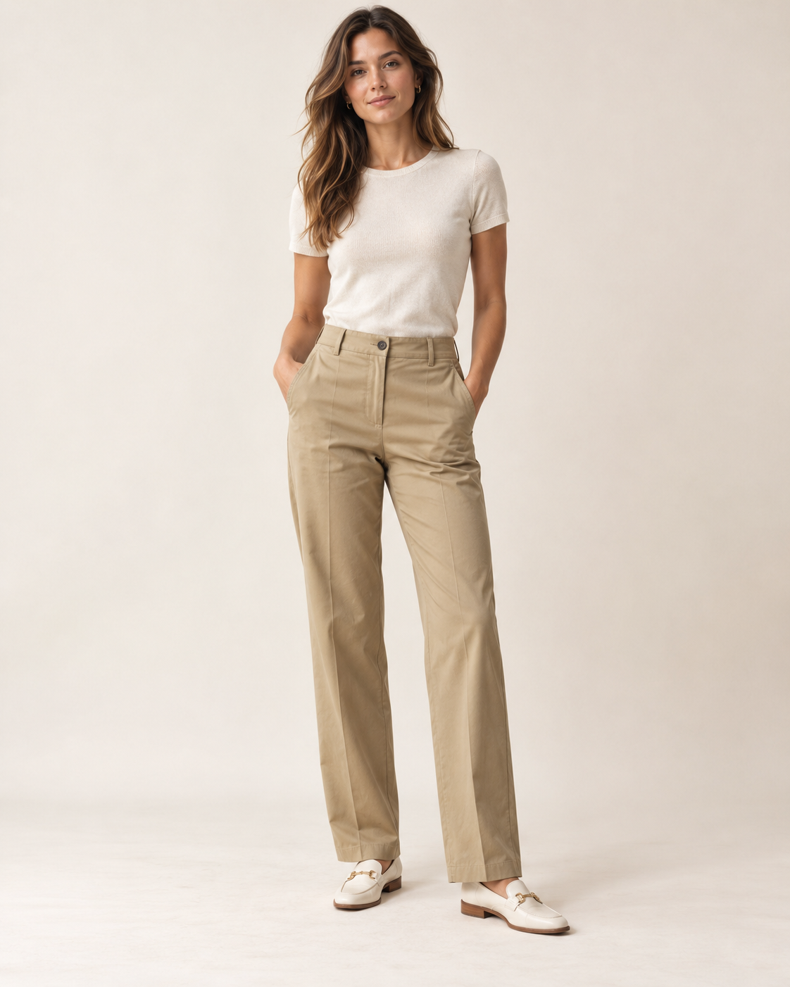 Woman wearing Solenne tailored chino trousers in sand
