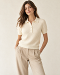 Woman wearing Solenne textured knit polo in ivory